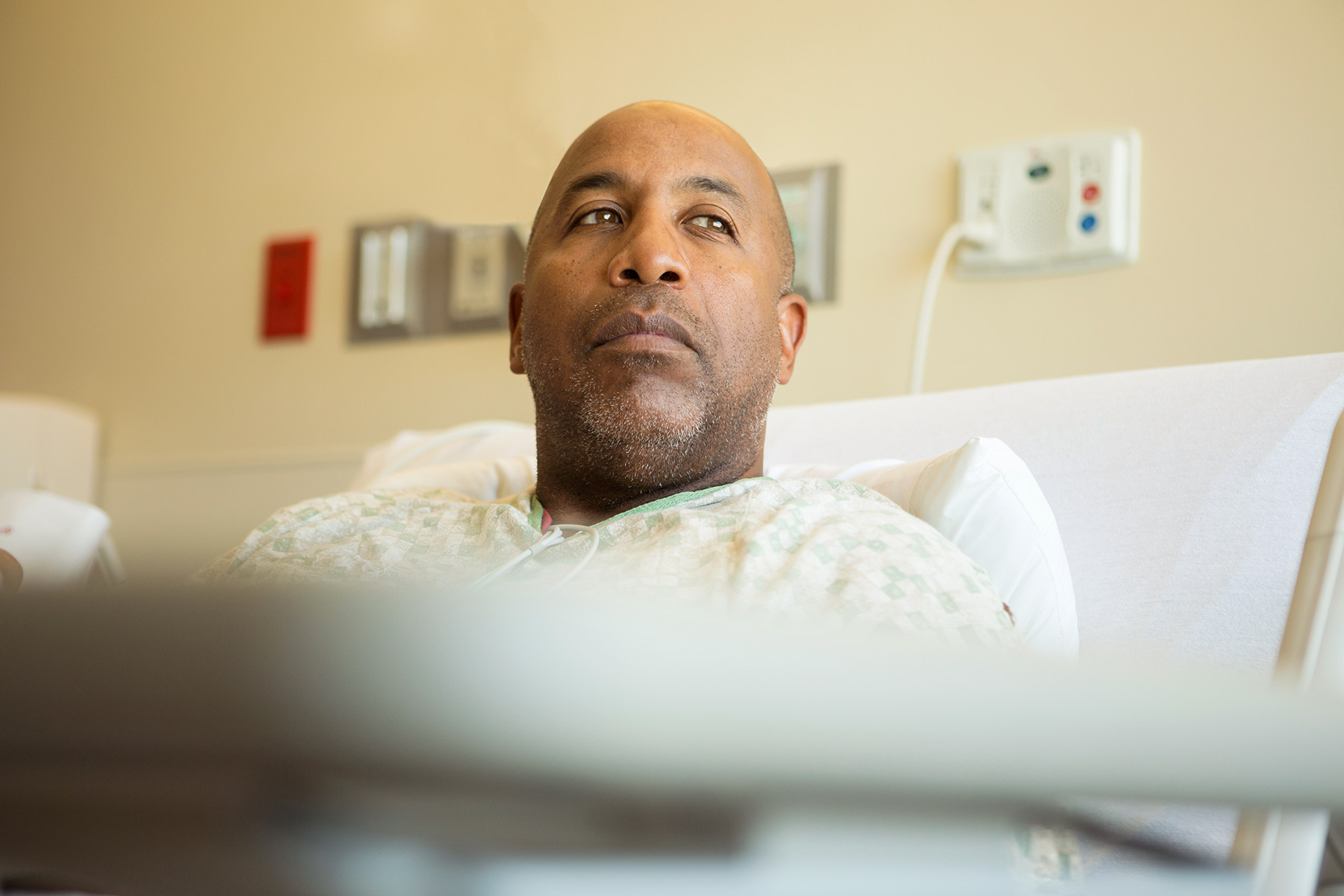 photo of man in hospital bed