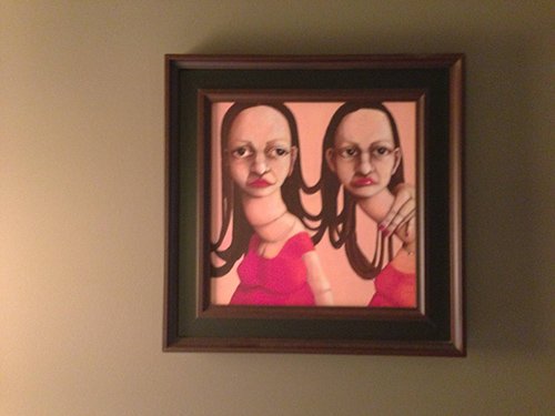 A very creepy painting above the bed depicting two girls with dead eyes and deformed, elongated necks. Does this image represent split personalities?